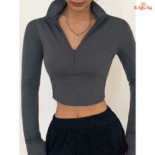 Slim-fit solid turtleneck crop top for women, featuring long sleeves and a sleek party look.