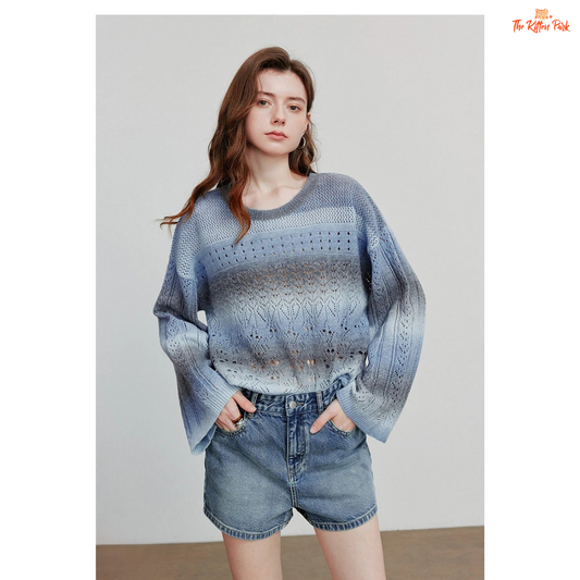 Women’s striped wool-blend pullover with loose fit, round neck, and bohemian style, designed for cozy autumn and winter wear.