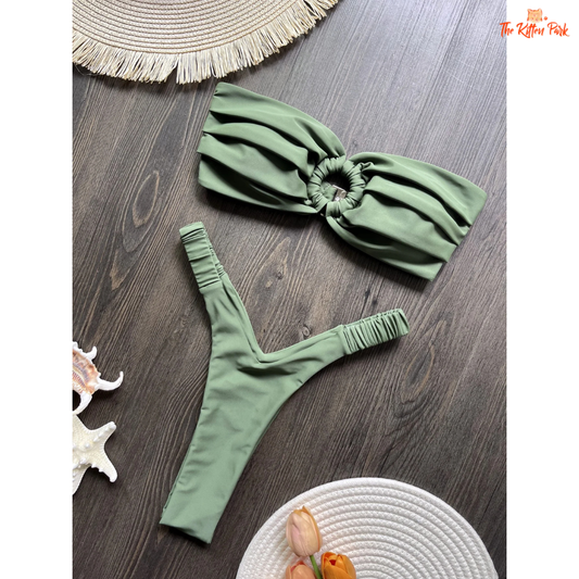 Sexy micro push-up bikini set featuring a Brazilian thong cut and wire-free support, designed for confident summer beachwear.