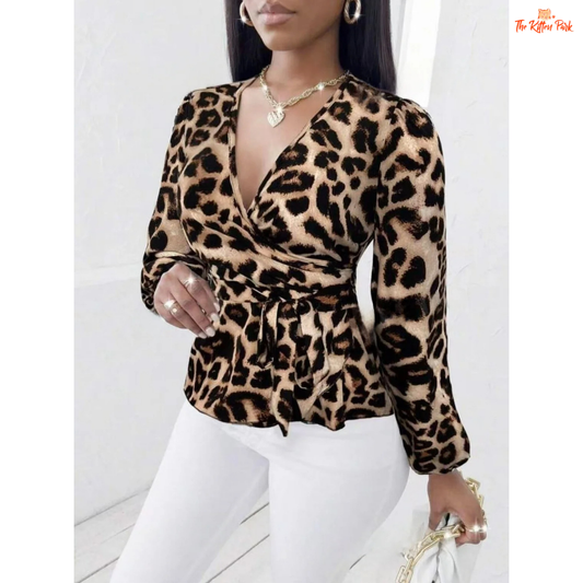 Slim-fit long sleeve shirt for women with leopard print, open-stitch front, and cinched waist, made of lightweight woven polyester — perfect for transitional seasons.
