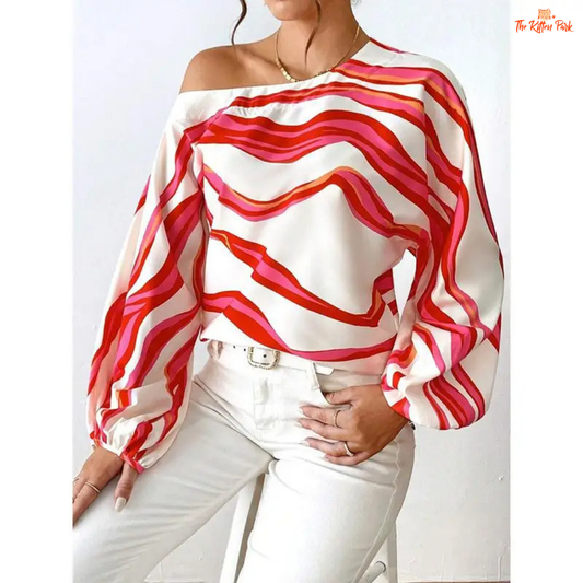 Women's off-shoulder printed blouse with puff sleeves, slash neckline, and a loose fit for spring and summer casual elegance.
