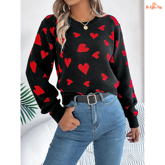 Women’s Contrast Color Heart Print Pullover Sweater featuring a soft pink background, acrylic heavyweight knit, O-neck design, and regular fit casual style for autumn and winter.