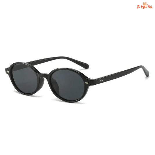 Retro-style small oval sunglasses with rivet detail and UV400 acrylic lenses for women, perfect for stylish and protective casual wear.