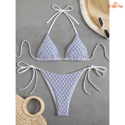 Sexy micro bikini set for women featuring lace-up straps, Brazilian thong design, chain details, solid and patchwork pattern, wire-free support.