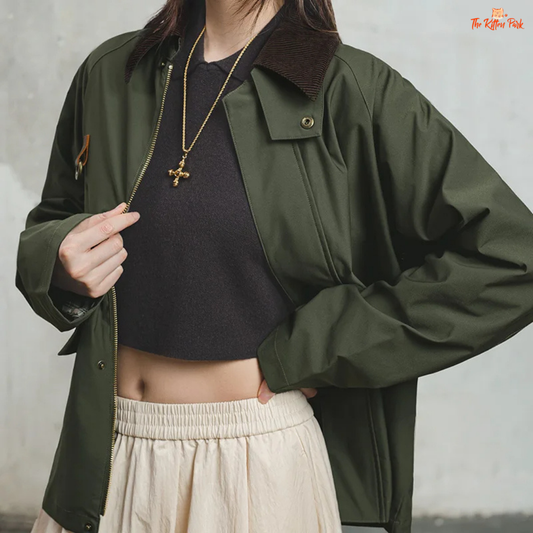 Vintage green corduroy jacket with lapel collar, patchwork design, zipper front, and safari-style pockets for autumn and winter wear.