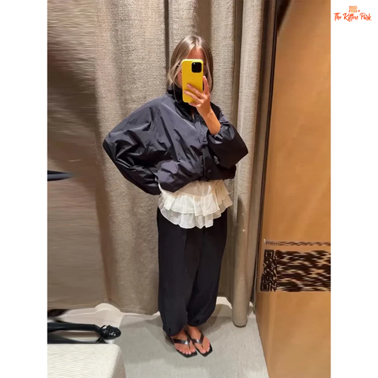 A women’s red short cotton jacket with stand collar, single-breasted closure, and pockets, designed in a slim retro streetwear style.