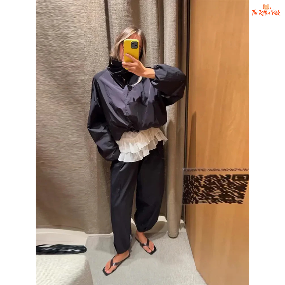 A womenβs red short cotton jacket with stand collar, single-breasted closure, and pockets, designed in a slim retro streetwear style.