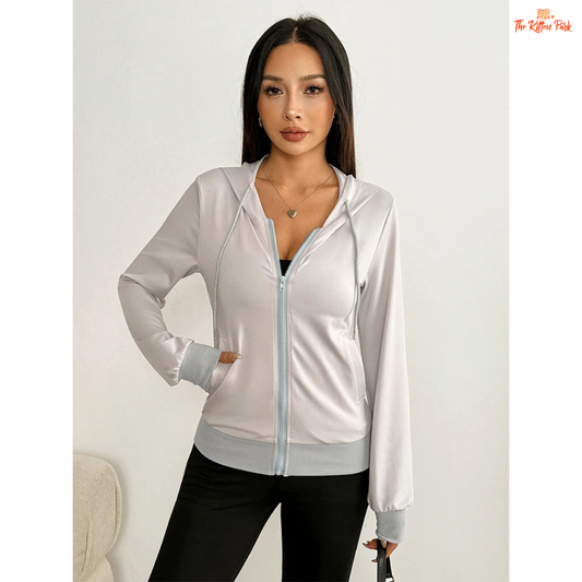 Cream-colored lace-up hooded zipper top for women with thick knit fabric and sporty pullover design, perfect for autumn outfits.
