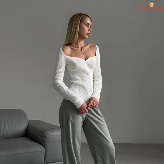 Elegant slim-fit knit top for women with square neckline and long sleeves, ideal for office or everyday wear.