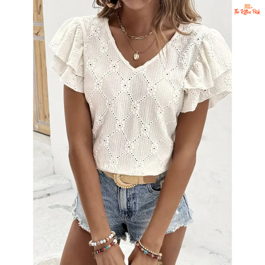 Women's jacquard summer blouse with diamond grid texture, pleated ruffles, and butterfly lotus sleeves for a soft and elegant seasonal style.