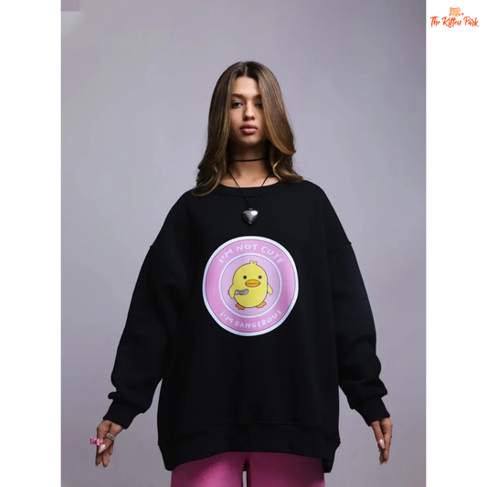 A women’s oversized cotton pullover sweatshirt with hooded collar, drop sleeves, and print design, styled for autumn/winter casual wear.