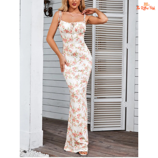 Elegant floral print maxi dress featuring a V-neckline, spaghetti straps, and empire waist—ideal for summer parties and vacation evenings.