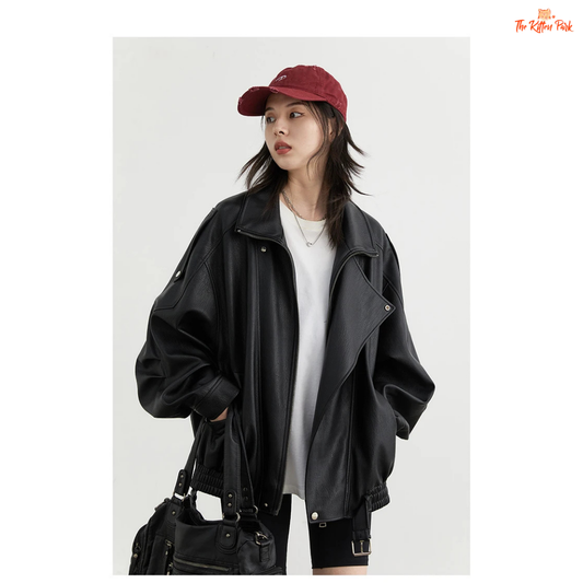 A retro PU leather jacket for women with a standing collar, single-breasted closure, and loose motorcycle coat design for autumn and spring wear.