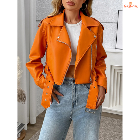 A women’s orange PU leather motorcycle jacket with lapel collar, zip closure, and casual biker style.