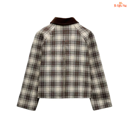 A women’s retro plaid cape jacket with a polo collar, wide-waisted fit, zipper closure, and French-inspired casual spring style.