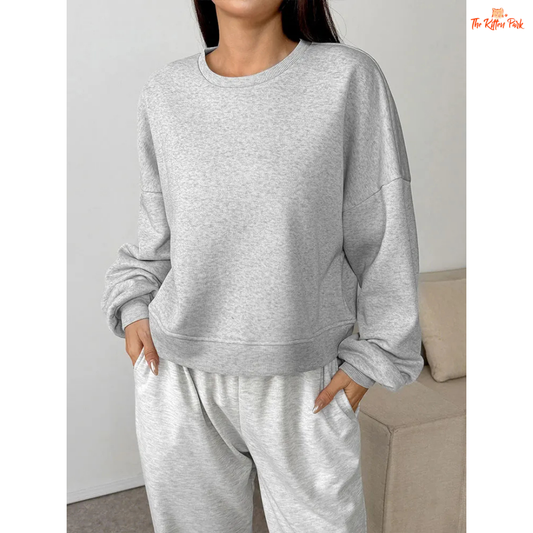 A slim-fit women’s pullover hoodie featuring an O-neck design, wool-lined interior, and soft knit texture