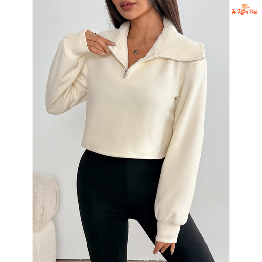 Solid zipper turn-down collar sweater for women featuring a thick tatting knit texture, zip-up front, and streetwear style in a warm cream tone.
