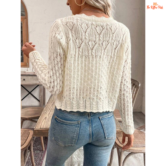 Women’s Spring & Autumn Solid Color Knit Cardigan in soft ivory, featuring button front design, hollow-out knit detail, and regular fit for elegant casual wear.