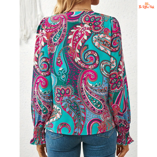 Women's V-neck paisley print chiffon blouse with pleated sleeves, ideal for spring and summer casual outfits.