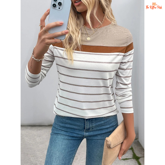 A women’s 3D stripe color block T-shirt with long sleeves, O-neck, and a loose casual fit for spring and autumn wear.
