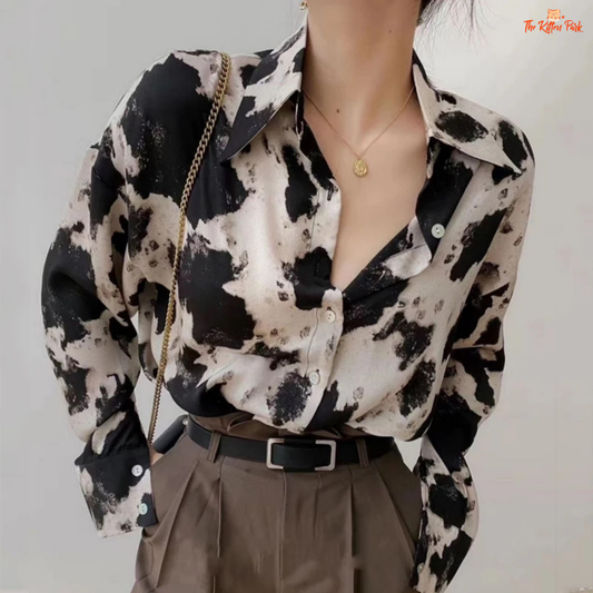 Loose long sleeve chiffon shirt for women featuring a cow print pattern, single-breasted button-up front, and classic collar — perfect for spring and summer streetwear.