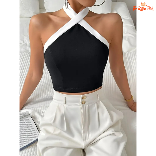 Women's halter neck tank top with contrast trim, backless and sleeveless design, ideal for spring and summer streetwear or casual club looks.