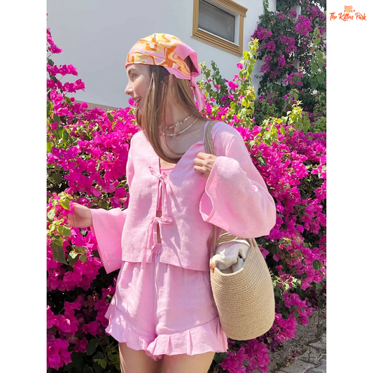 Cotton 2-piece set with a lace-up V-neck long sleeve blouse and high-waisted elastic shorts, designed for stylish comfort in spring and summer.