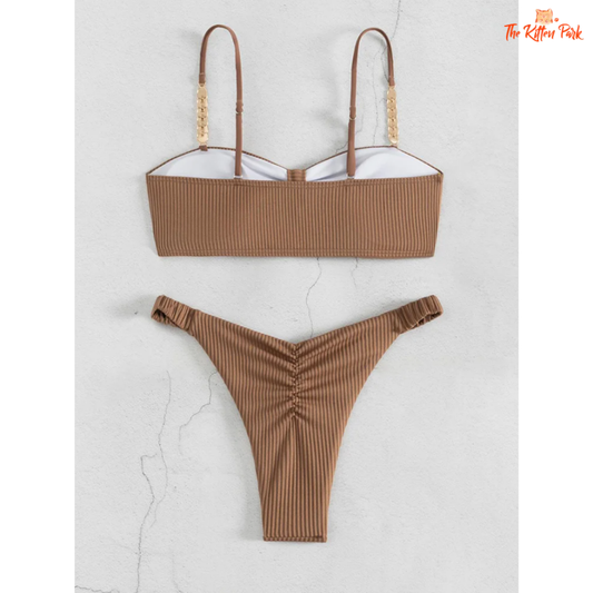 2025 Sexy Spaghetti Strap Bikini – High-waisted two-piece swimsuit with hollow-out metal details, wire-free support, and solid beachwear style.