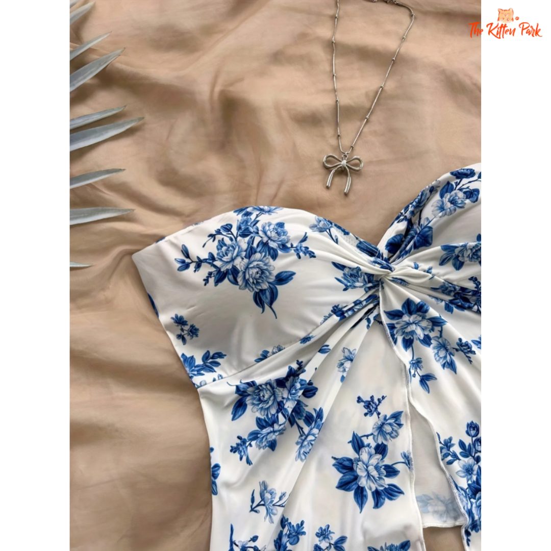 Women's Euro-style holiday blouse featuring a strapless asymmetric design with floral print — ideal for summer beachwear and vacation looks.