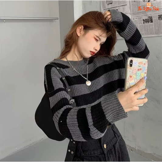 Striped cropped knit sweater with an oversized Korean vintage fit, perfect for cozy autumn layering.