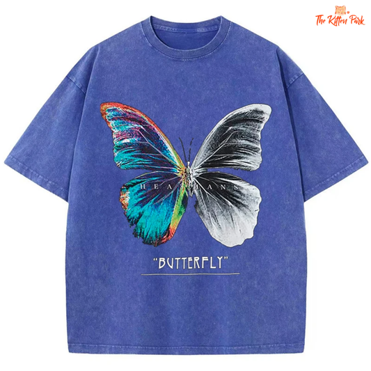 Loose-fit washed cotton T-shirt for women featuring a butterfly split cartoon print and distressed detailing—perfect for summer streetwear looks.