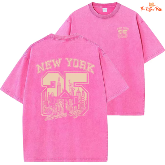 Vintage washed NYC graphic t-shirt with drop sleeves and distressed details, made of cotton for summer comfort.