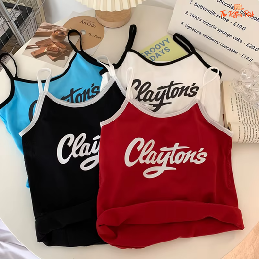 Y2K style crop top with patchwork design and letter print, sleeveless and fitted for summer wear.