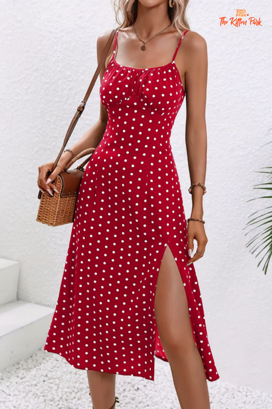 Boho-style polka dot slit midi dress with spaghetti straps, slash neckline, and mid-calf length; made of lightweight polyester fabric in summer tones.