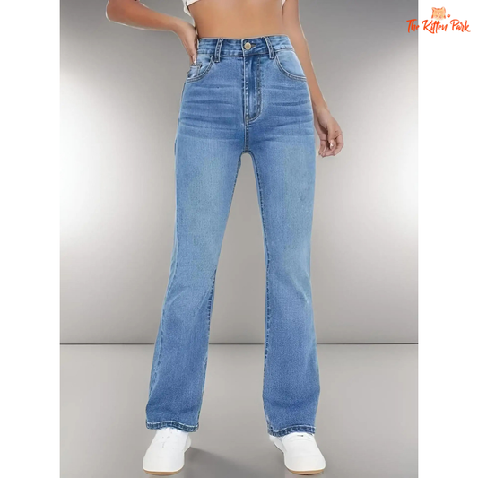 High-waisted washed denim jeans for women featuring a bootcut silhouette, slimming loose fit, zipper fly, and soft full-length fabric for everyday comfort.