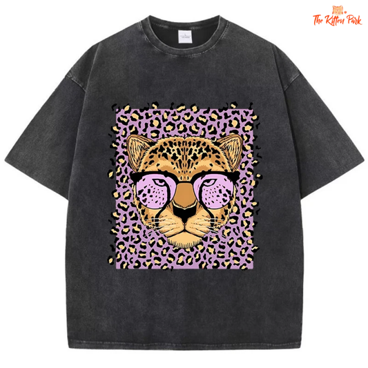 Vintage acid wash oversized cotton T-shirt for women featuring a funny leopard cartoon print and distressed streetwear style.
