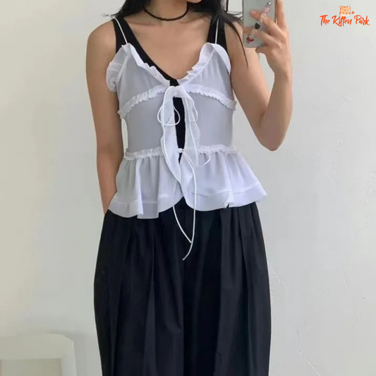 Sheer chiffon tie cami with ruffled hem and backless Y2K festival style, crafted from chiffon and spandex blend.