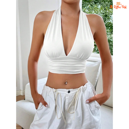 Y2K deep V-neck halter crop top for women, backless and sleeveless, perfect for bold summer party looks.