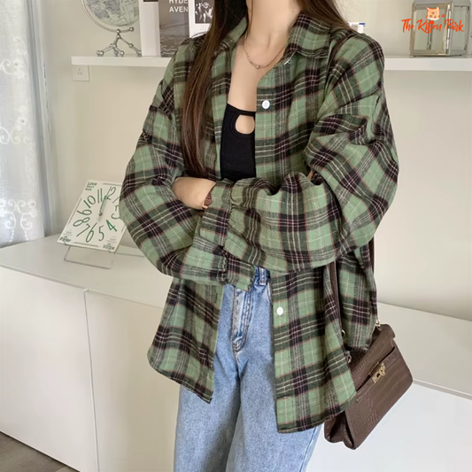 Oversized tartan flannel shirt in grunge style with a plaid pattern, designed for spring and summer layering.