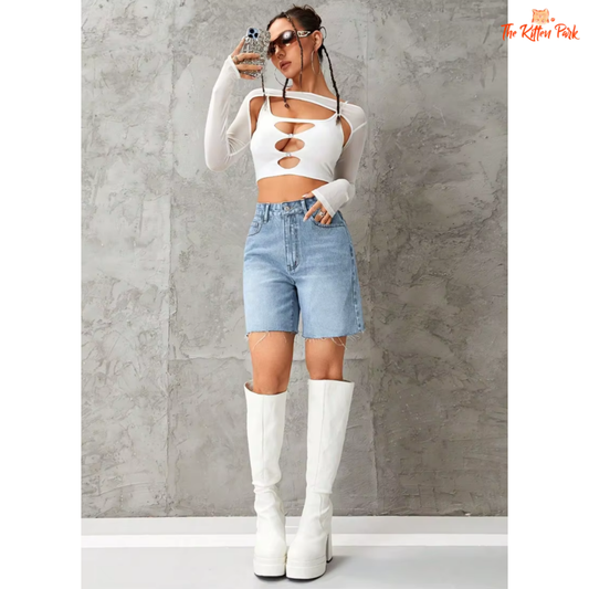 Loose fit mid-waist denim shorts for women in a classic streetwear cut, designed for spring and summer comfort with button fly closure.