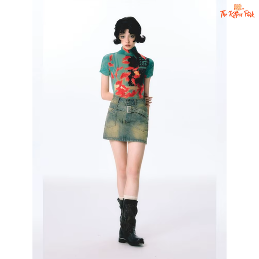 Slim fit Y2K turtleneck top with cartoon fish print and fold details, styled for summer streetwear looks.