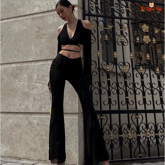 lack lace-up crop top featuring a V-neckline, cut-out details, and long sleeves; made from a cotton-polyester blend with a skinny fit for streetwear style.