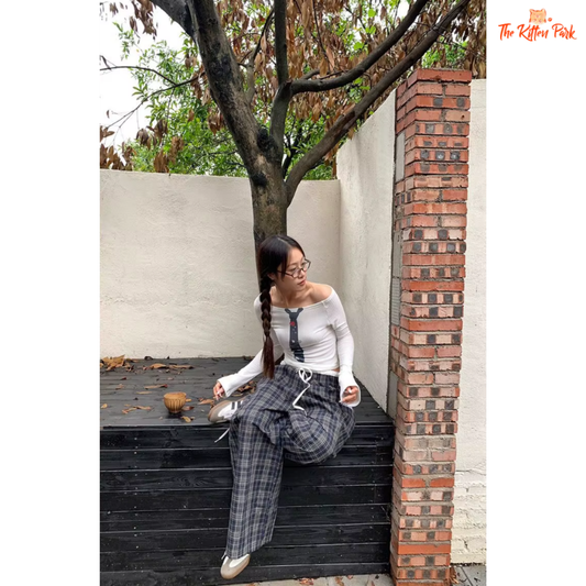 Women's high-waisted plaid patchwork wide-leg pants with lace detailing, Y2K vintage streetwear style made from cotton-polyester broadcloth.