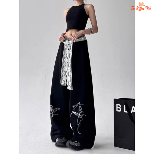 Y2K butterfly lace patchwork sweatpants with high waist, wide-leg fit, and vintage streetwear vibe—perfect for spring/summer statement looks.