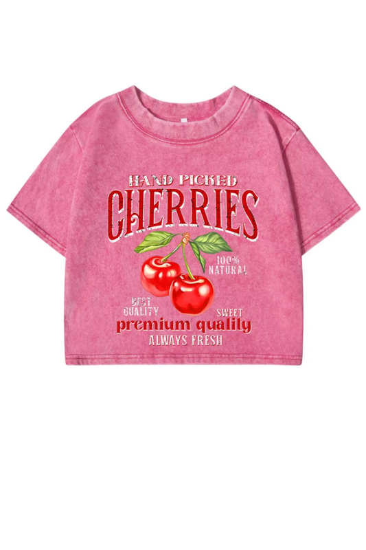 Oversized women’s white cotton T-shirt with cherry print and distressed finish, streetwear style with O-neck and short sleeves