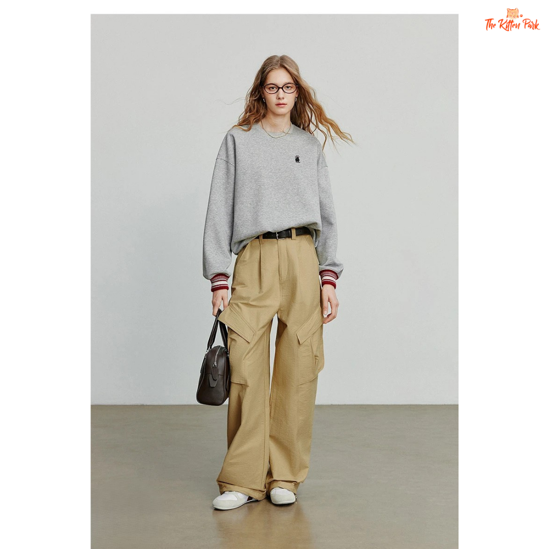 2026 Women's Cat Embroidery Striped Sleeve Cotton Pullover with cute cat embroidery, striped sleeves, and loose casual autumn style.