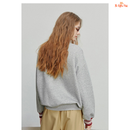 2026 Women's Cat Embroidery Striped Sleeve Cotton Pullover with cute cat embroidery, striped sleeves, and loose casual autumn style.