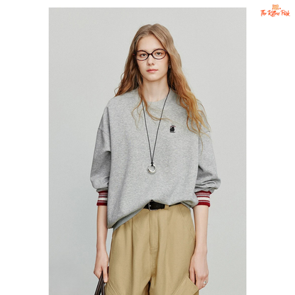 2026 Women's Cat Embroidery Striped Sleeve Cotton Pullover with cute cat embroidery, striped sleeves, and loose casual autumn style.