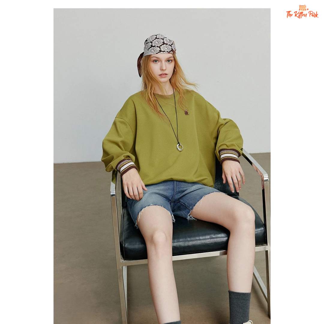 2026 Women's Cat Embroidery Striped Sleeve Cotton Pullover with cute cat embroidery, striped sleeves, and loose casual autumn style.