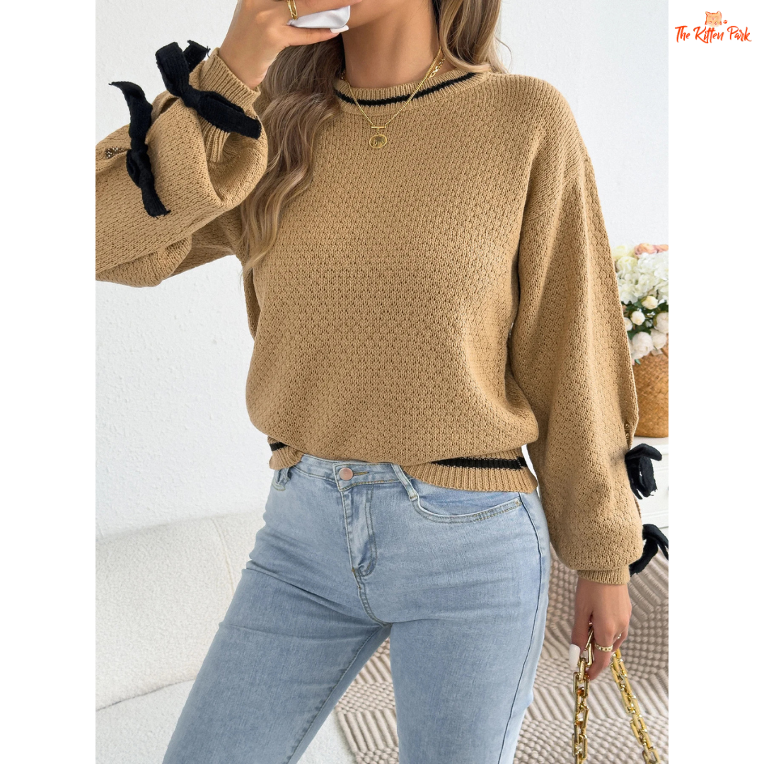 Acrylic knit 2026 Women’s Color Block Bow Knit Sweater with lantern sleeves, striped pattern, and bow detail in a casual autumn/winter style.